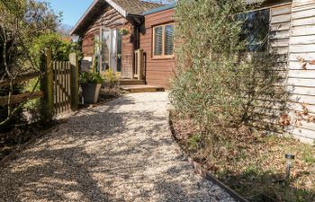 Woodmancote Lodge Holiday Cottage