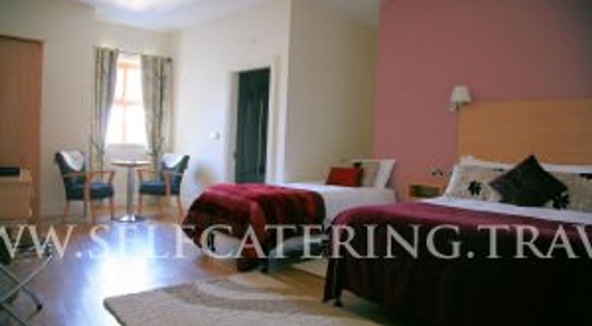 Photo of Coach House Hotel