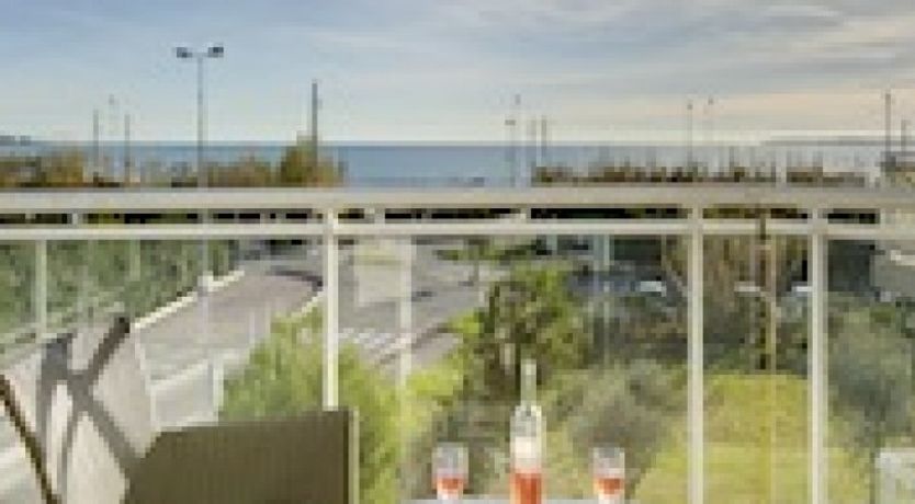 Photo of Juan Flore -Sandy beach, Pool, Sea view etc