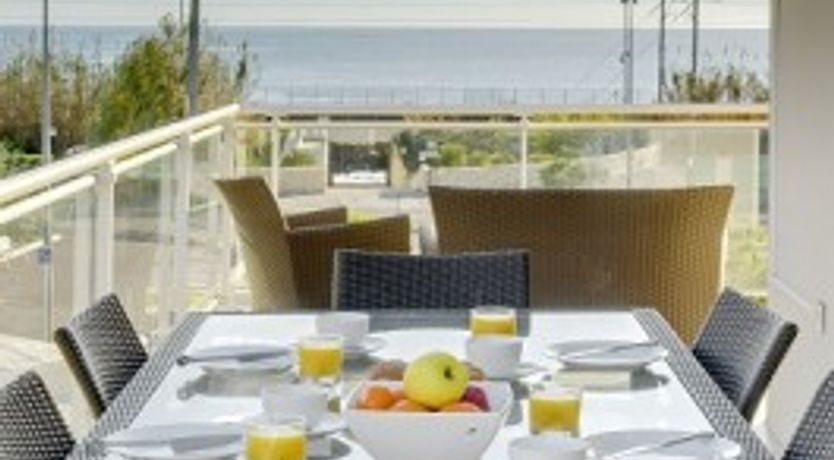 Photo of Juan Flore -Sandy beach, Pool, Sea view etc