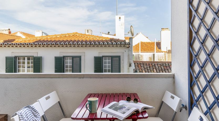 Photo of Over Orange Roofs