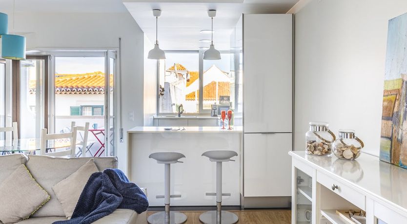 Photo of Over Orange Roofs