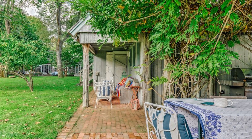Photo of Sunflowers & Wisteria