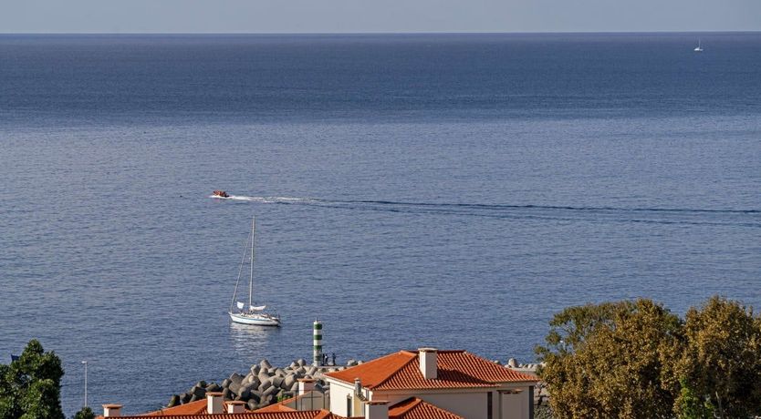 Photo of The Boats Go By