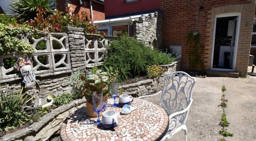 Photo of 4 Bed in Swanage