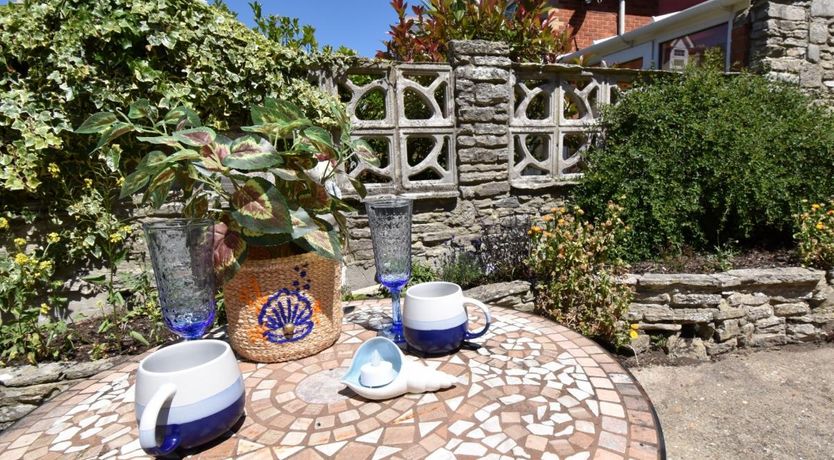 Photo of 4 Bed in Swanage