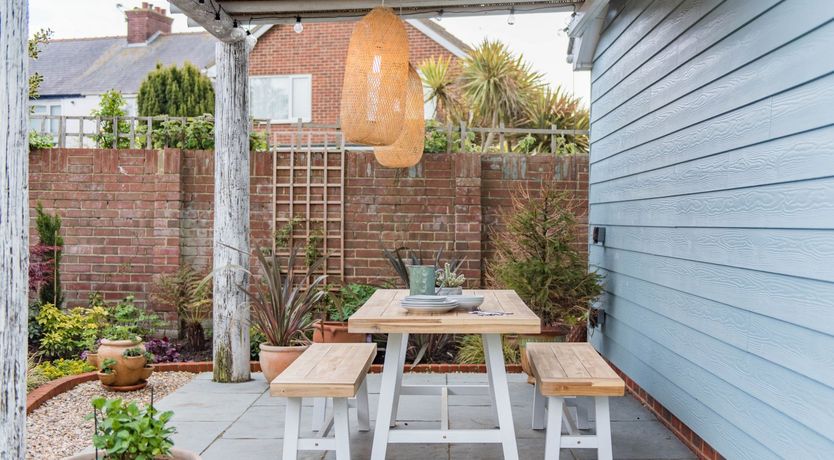 Photo of Three Wooden Boats
