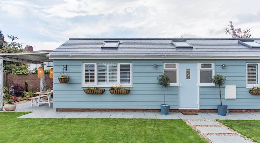Photo of Three Wooden Boats