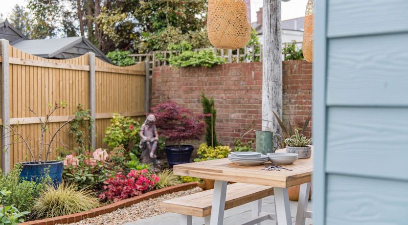 Photo of Three Wooden Boats