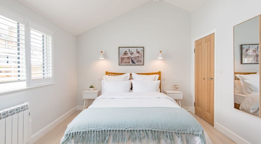 Photo of Three Wooden Boats