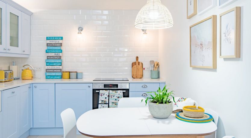 Photo of Three Wooden Boats