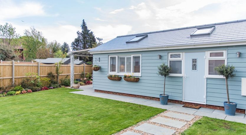 Photo of Three Wooden Boats