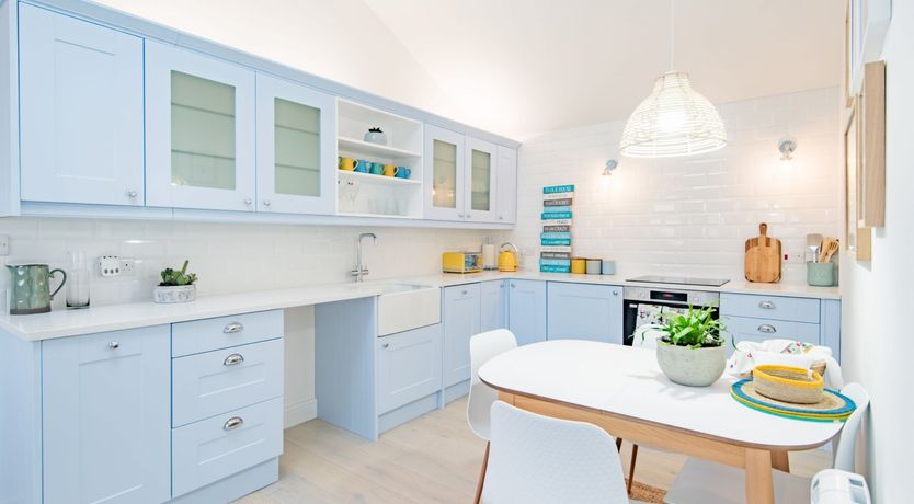 Photo of Three Wooden Boats