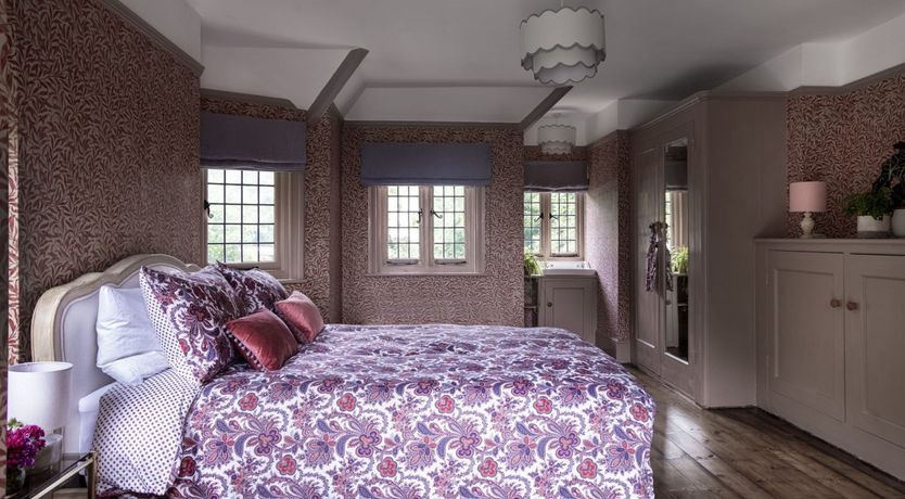 Photo of Hollyhocks By The Sea