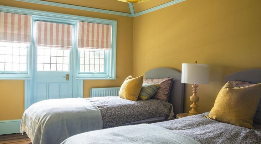 Photo of Hollyhocks By The Sea