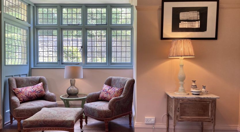 Photo of Hollyhocks By The Sea