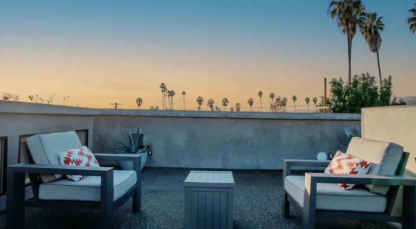 Photo of Sunset over the Palm Trees