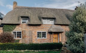 Photo of Thatched Roof Romance