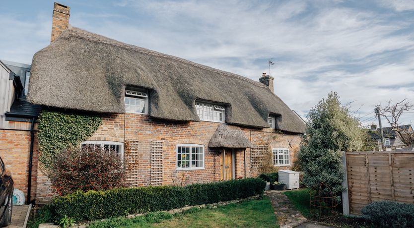 Photo of Thatched Roof Romance