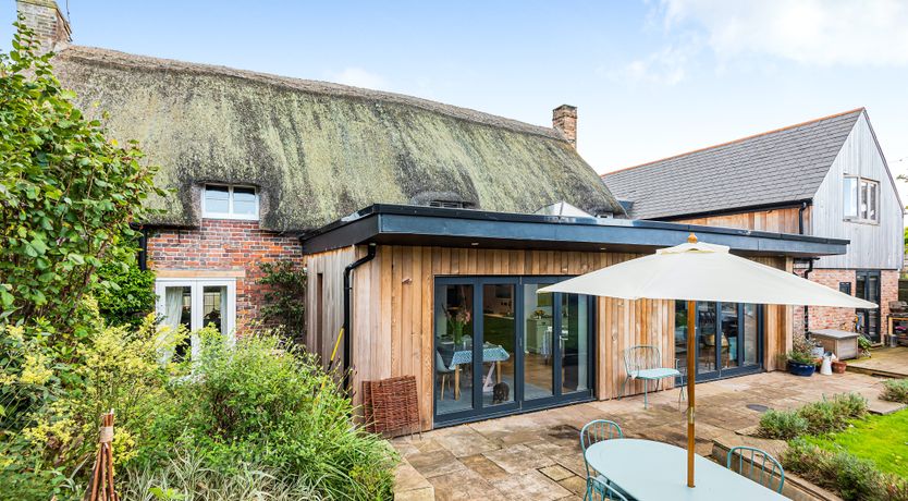Photo of Thatched Roof Romance