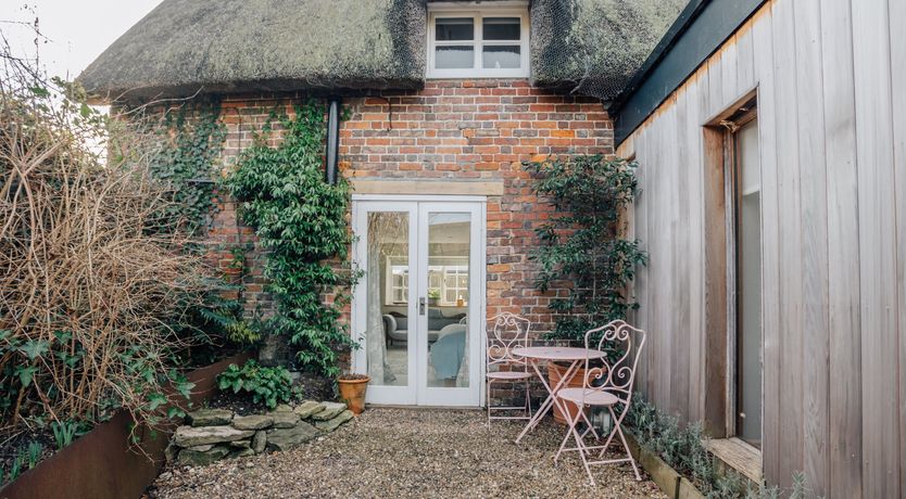 Photo of Thatched Roof Romance