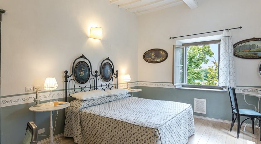 Photo of Between The Olive Groves