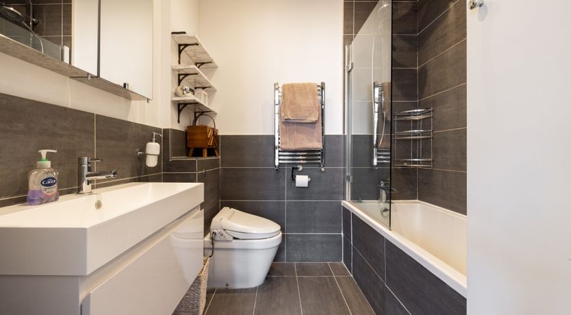 Photo of Reading by the Window