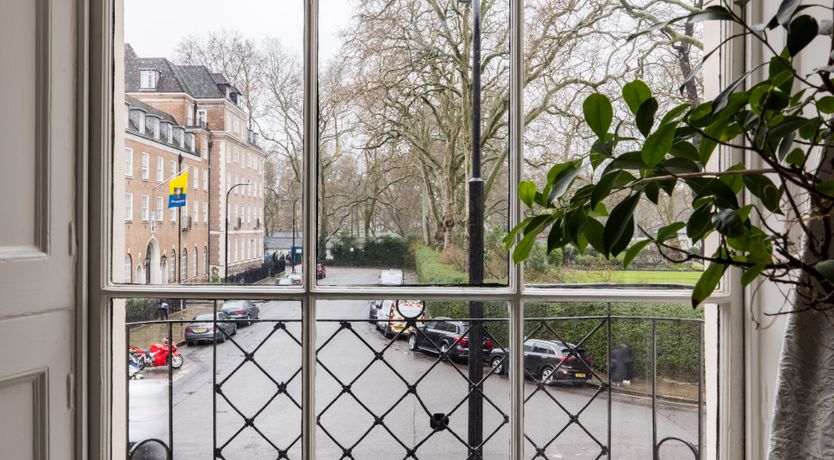 Photo of Reading by the Window