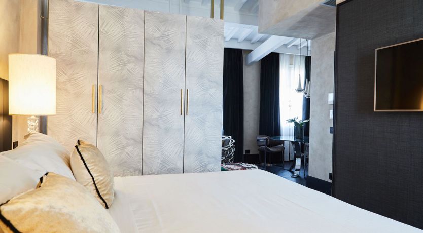 Photo of Glinting Off the Arno River