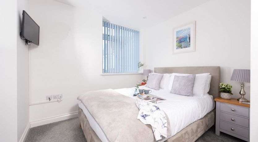 Photo of New In Town