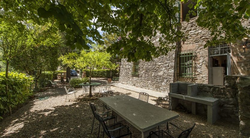 Photo of Brick & Green Shutters