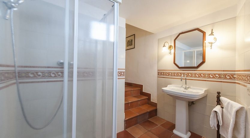 Photo of Brick & Green Shutters