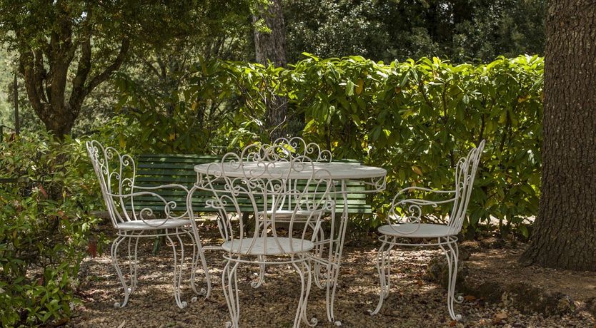 Photo of Brick & Green Shutters