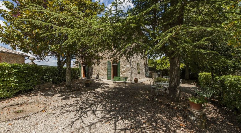 Photo of Brick & Green Shutters