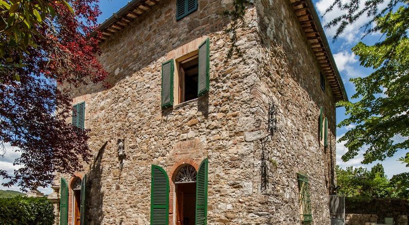 Photo of Brick & Green Shutters