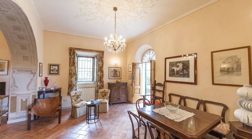 Photo of Brick & Green Shutters