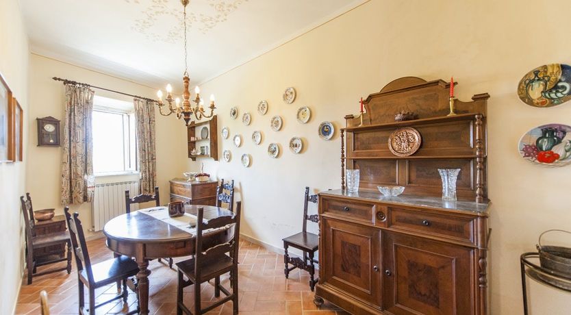 Photo of Brick & Green Shutters