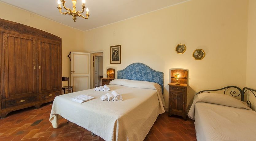 Photo of Brick & Green Shutters