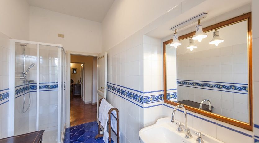 Photo of Brick & Green Shutters