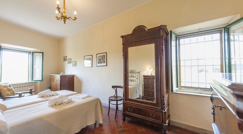 Photo of Brick & Green Shutters