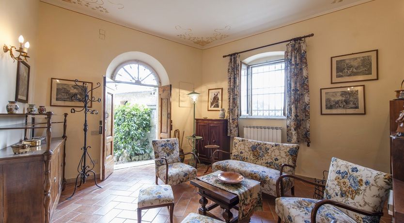 Photo of Brick & Green Shutters