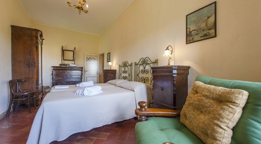 Photo of Brick & Green Shutters