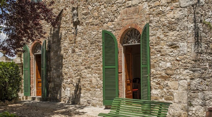 Photo of Brick & Green Shutters