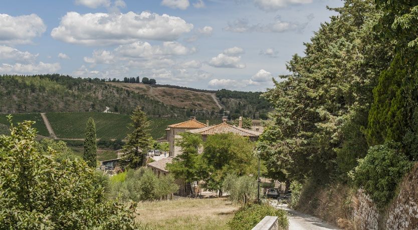 Photo of Brick & Green Shutters