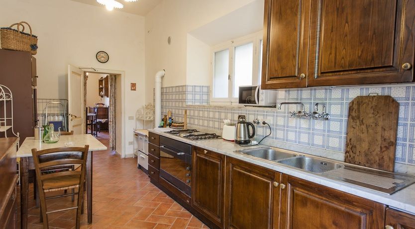 Photo of Brick & Green Shutters