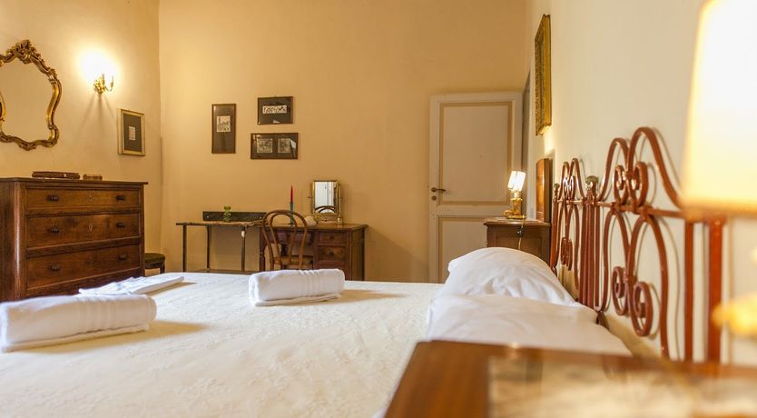 Photo of Brick & Green Shutters