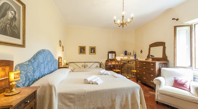 Photo of Brick & Green Shutters