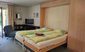 Photo of Residenza Parcolago Apt 018 mit Garten Apartment 29