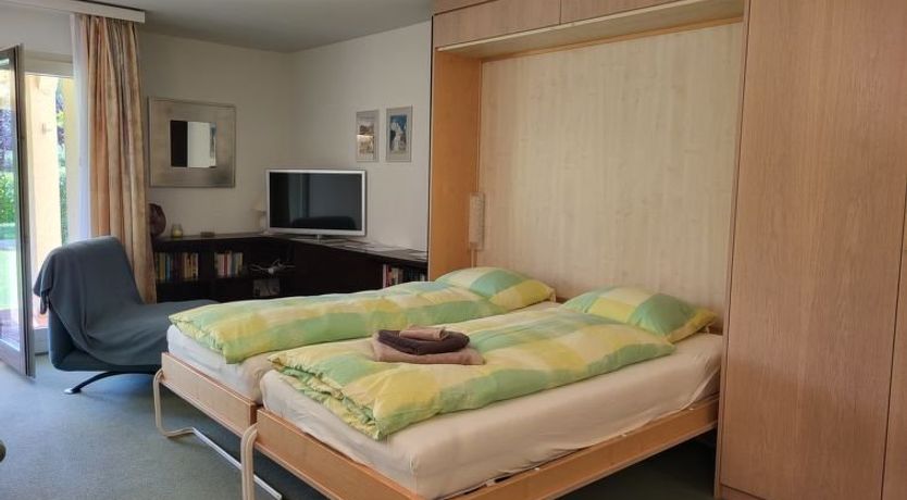 Photo of Residenza Parcolago Apt 018 mit Garten Apartment 29