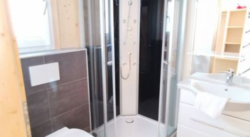 Photo of mit 3 Schlafzimmern & IR-Sauna Apartment 21